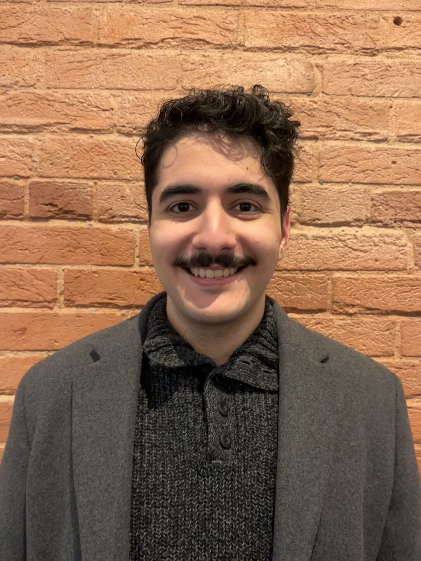 A portrait photo of MItHRIL member Roy El-Helou.